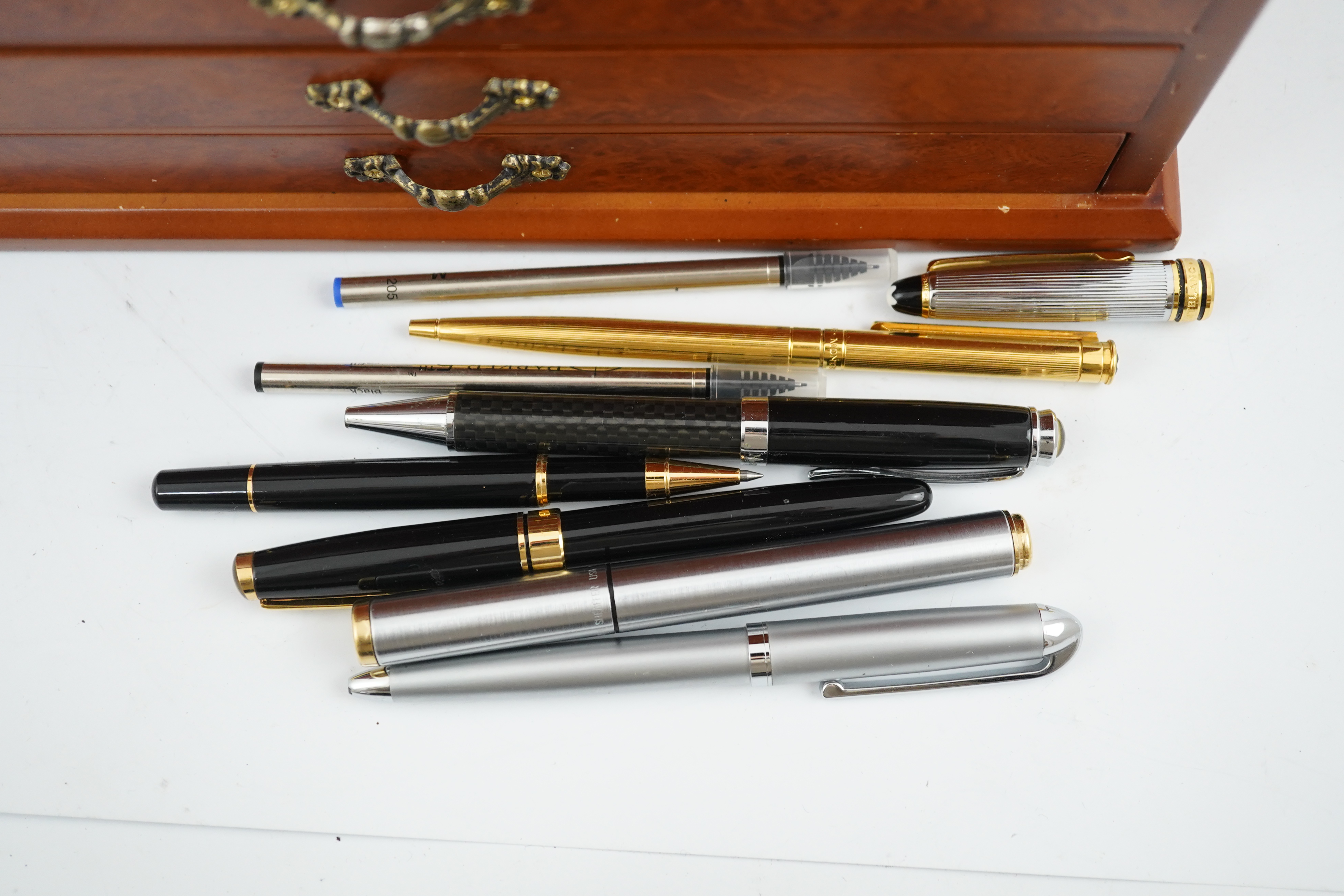 A large quantity of pens etc. and collector's cabinet